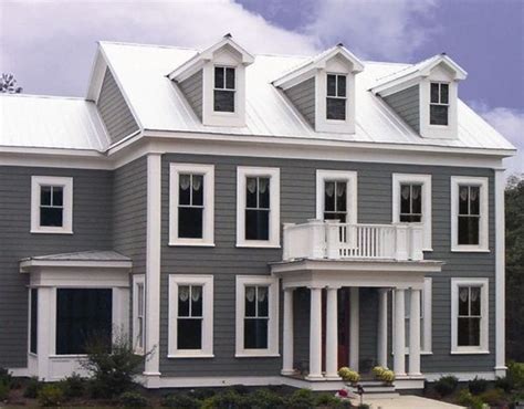 gray house white metal roof|gray houses with dark trim.